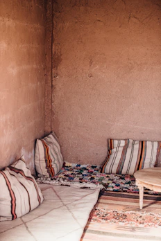 A rustic farmhouse room with a braided jute round rug adding natural warmth to the space.