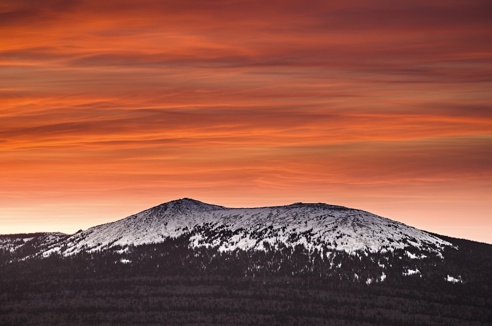 mountain alps with orange sky