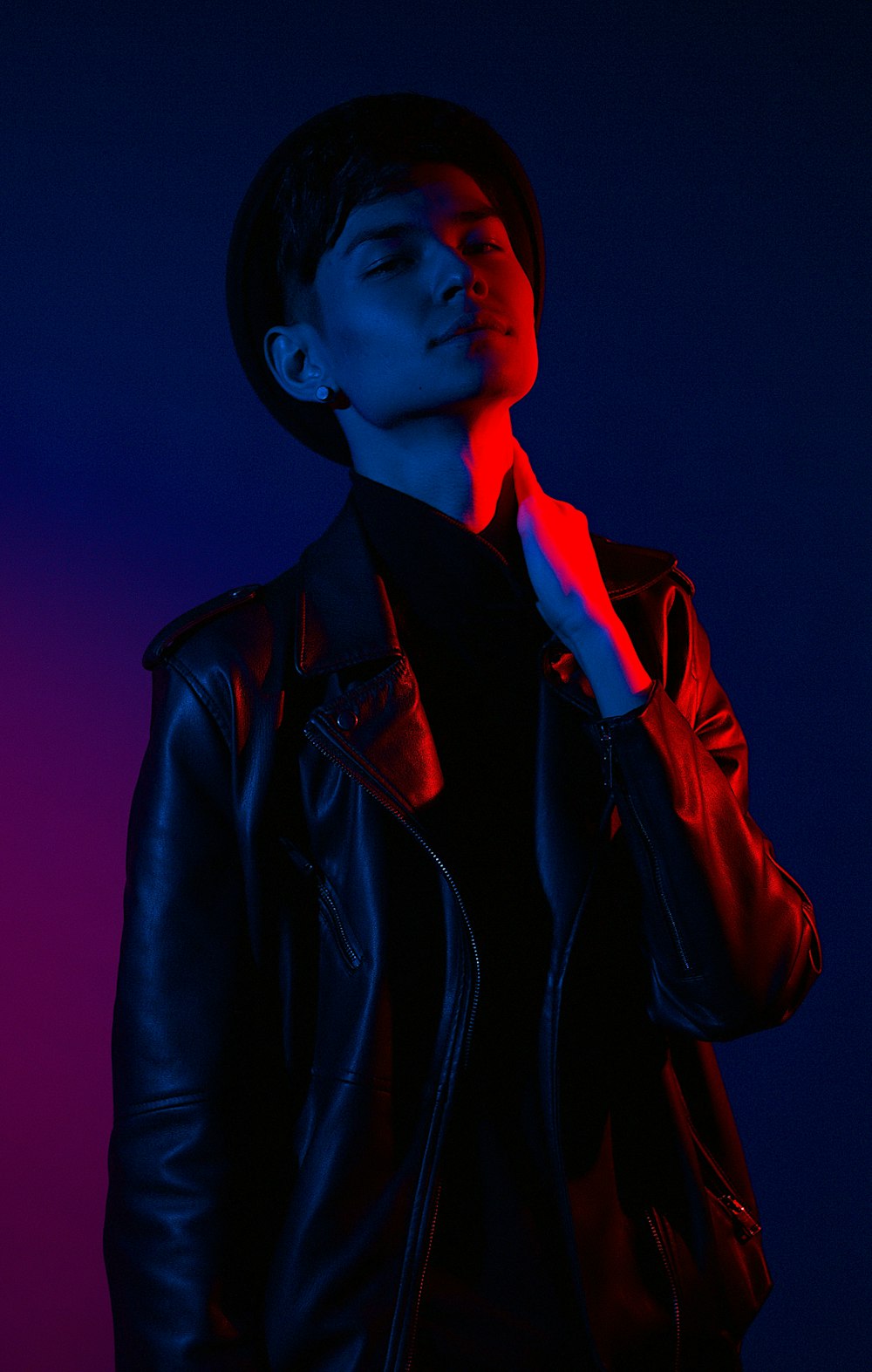 man wearing black leather jacket