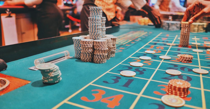 a casino table with a lot of chips on it