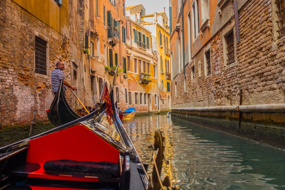 man on canoe in Venice Grand Canal