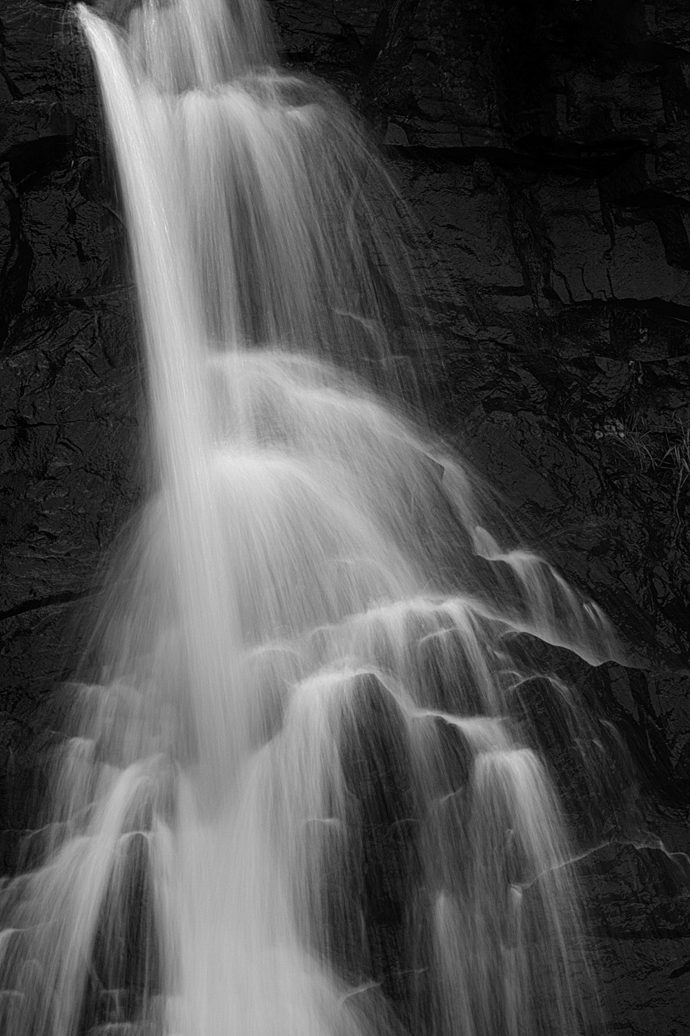grayscale photo of waterfall
