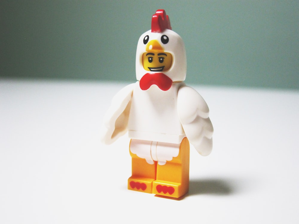 LEGO chicken minifig on table