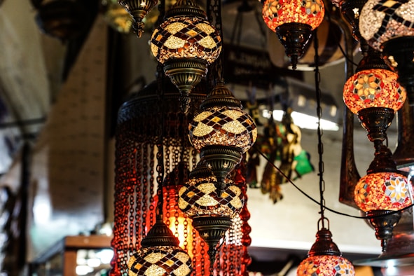 red, brown, and white downlight chandelier