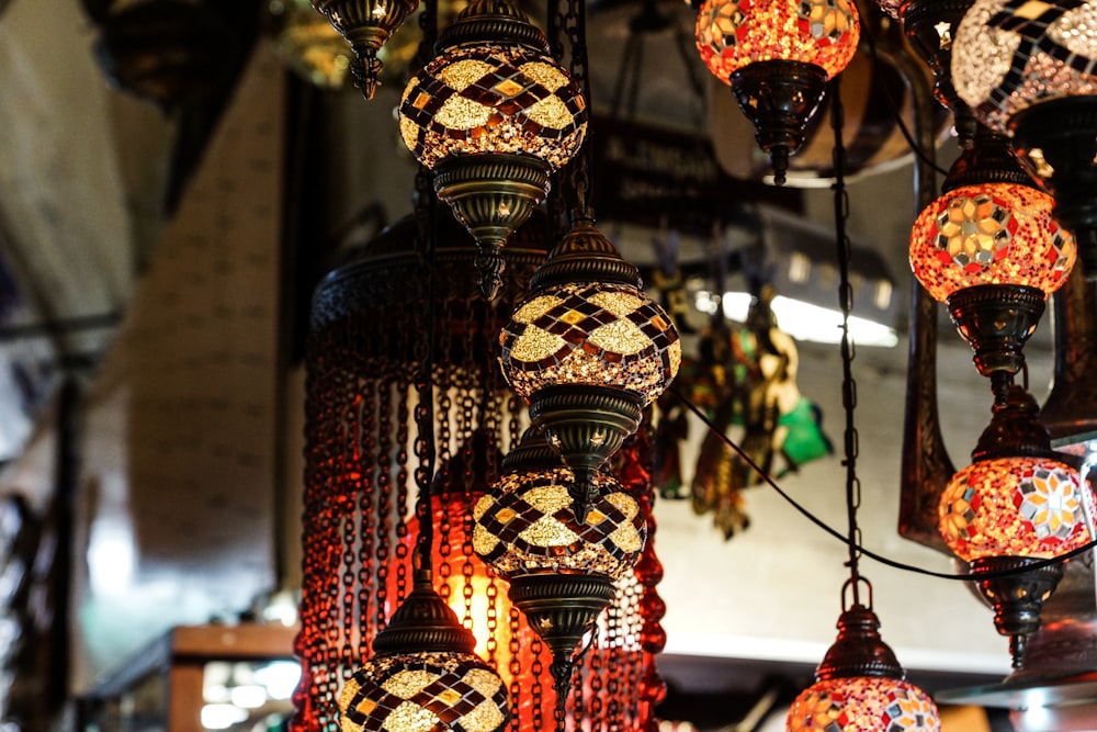 red, brown, and white downlight chandelier