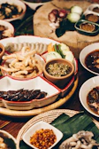 Close-up of traditional Thai dishes beautifully arranged on a banquet table.