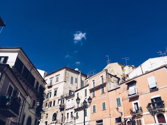 grey and orange buildings under blue sky in Chieti Italy