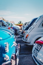 assorted-color vehicle park during daytime