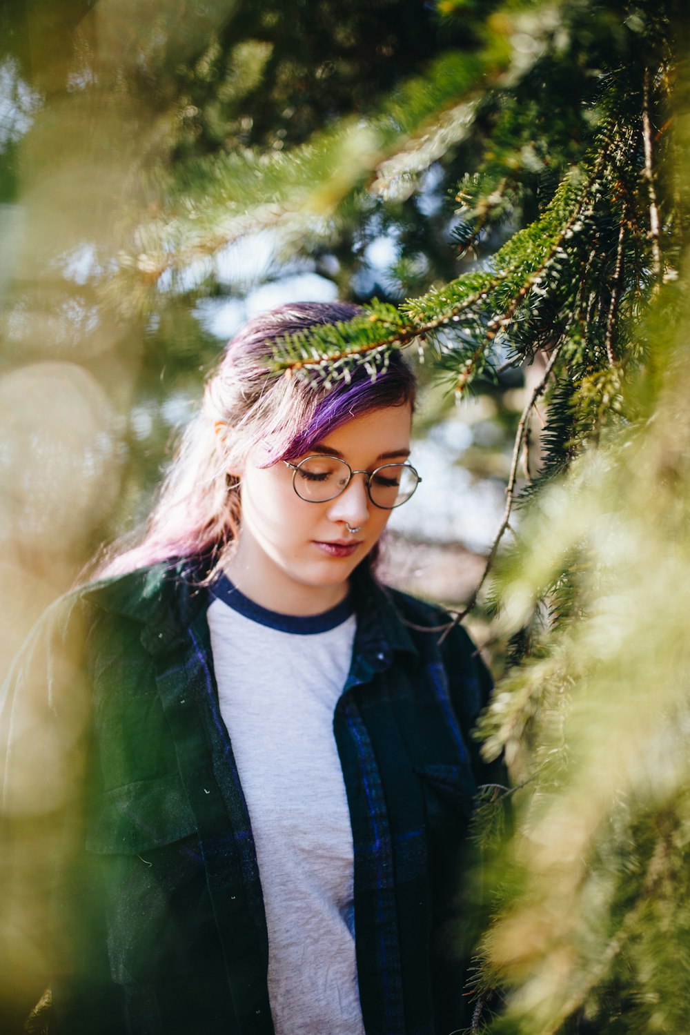 woman standing near tree