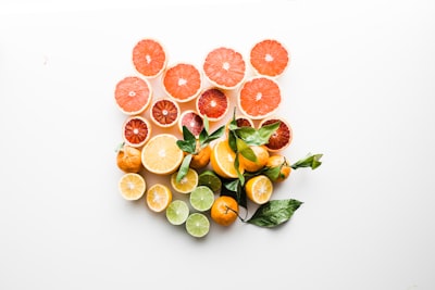 sliced fruit on white surface frankincense google meet background