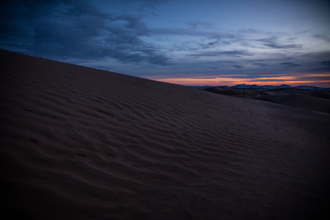 desert sand under orange sky