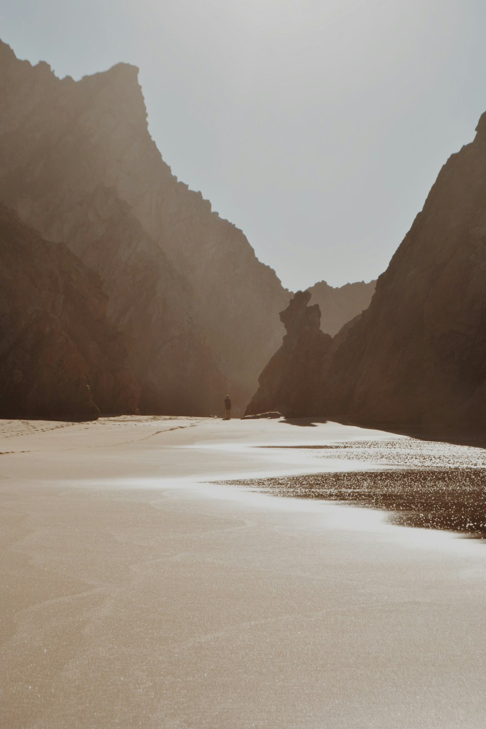 man walking near shore