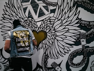 Custom denim jacket with unique hand-painted artwork.