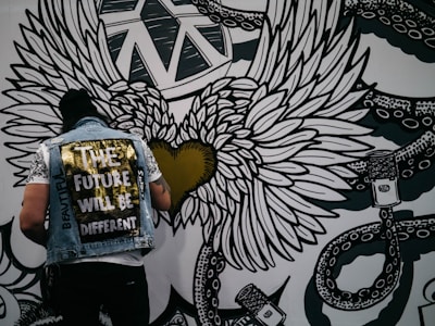 Custom denim jacket with unique hand-painted artwork.