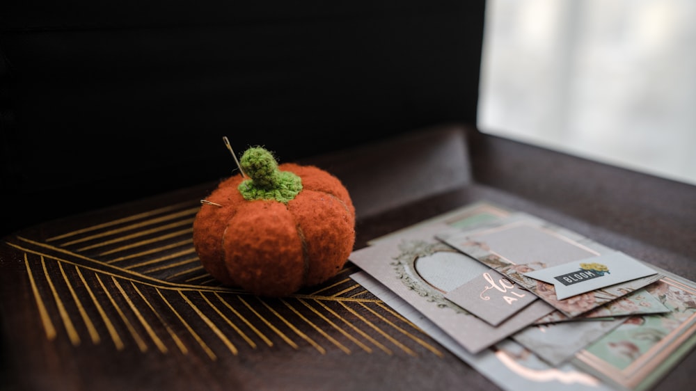 orange pumpkin pin cushion