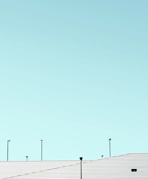 white roofs and teal sky