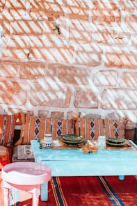 plates on coffee table beside sofa