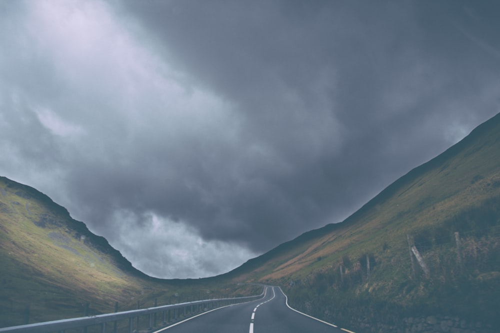 empty road near grass field