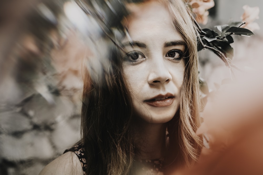 a woman with a flower in her hair