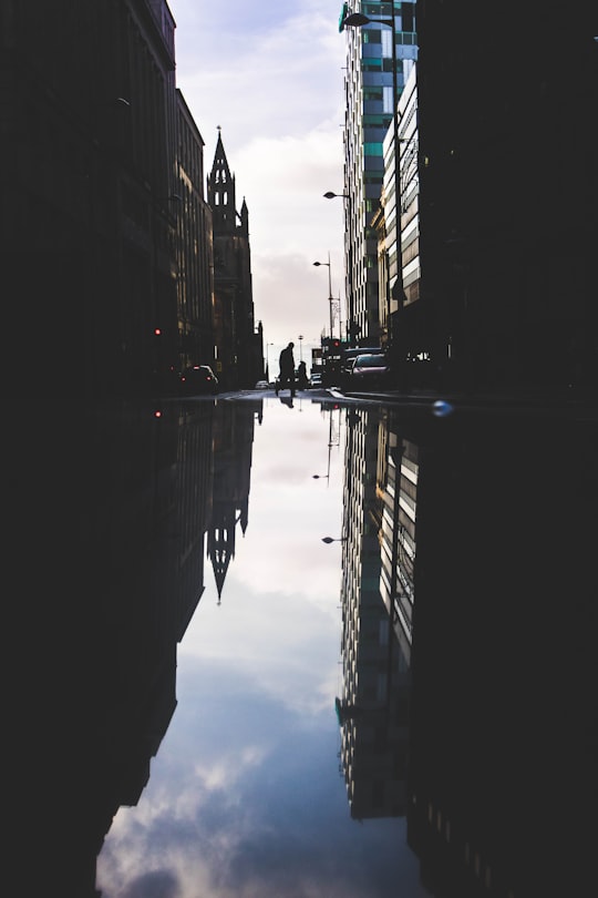 landscape photography of high-rise buildings with reflection on the water in Liverpool United Kingdom