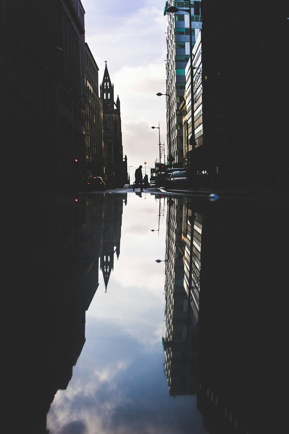 landscape photography of high-rise buildings with reflection on the water