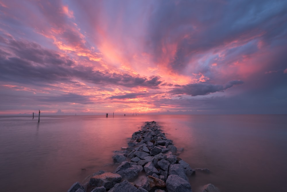 stones on body of water