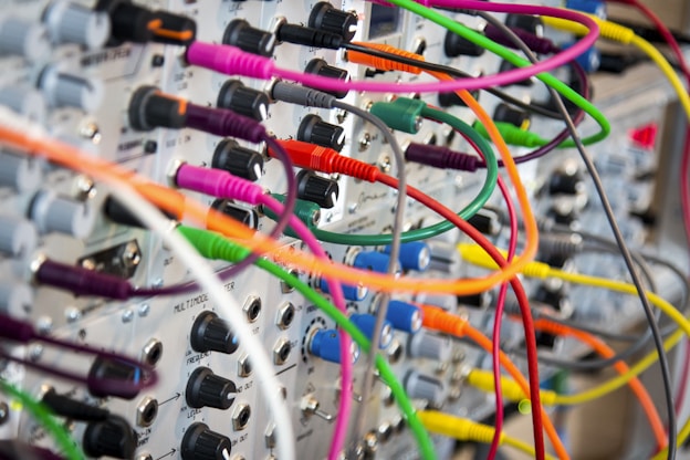 assorted electric cables found in an underground electrical box