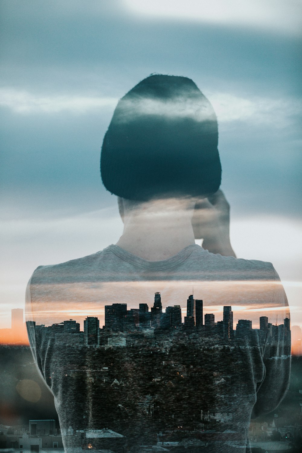 back view of person with cityscape view