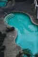 swimming pool during daytime in aerial view photography
