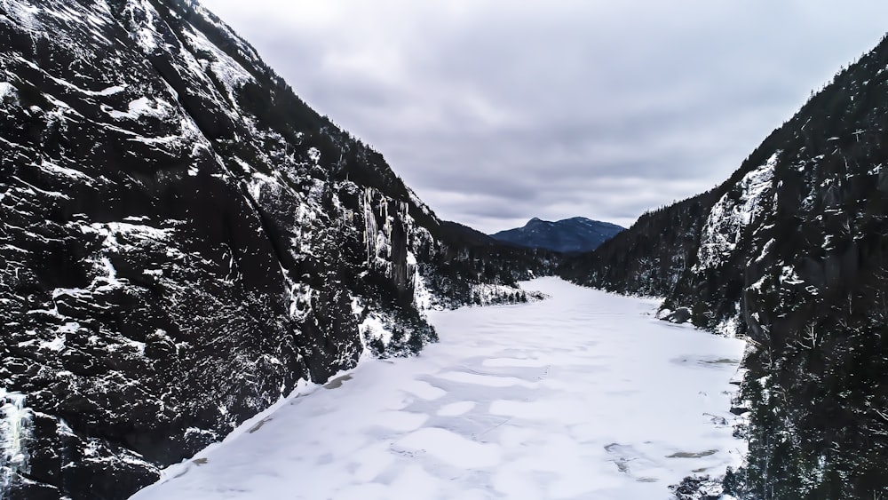 body of water between mountains