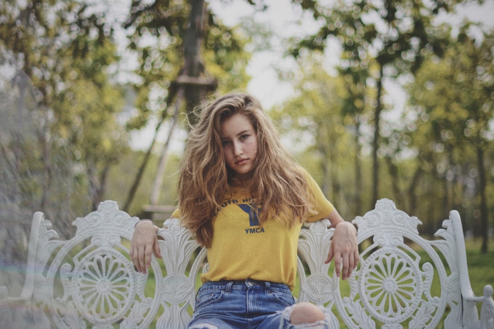 woman sitting on patio bench outdoor