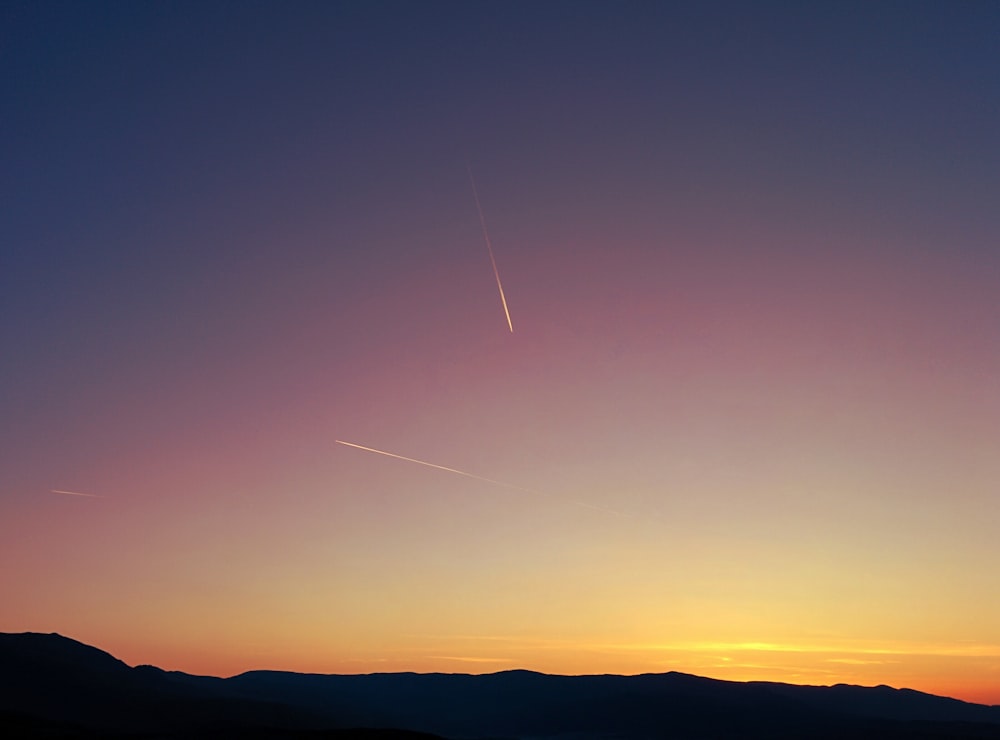 mountain silhouette during golden hour