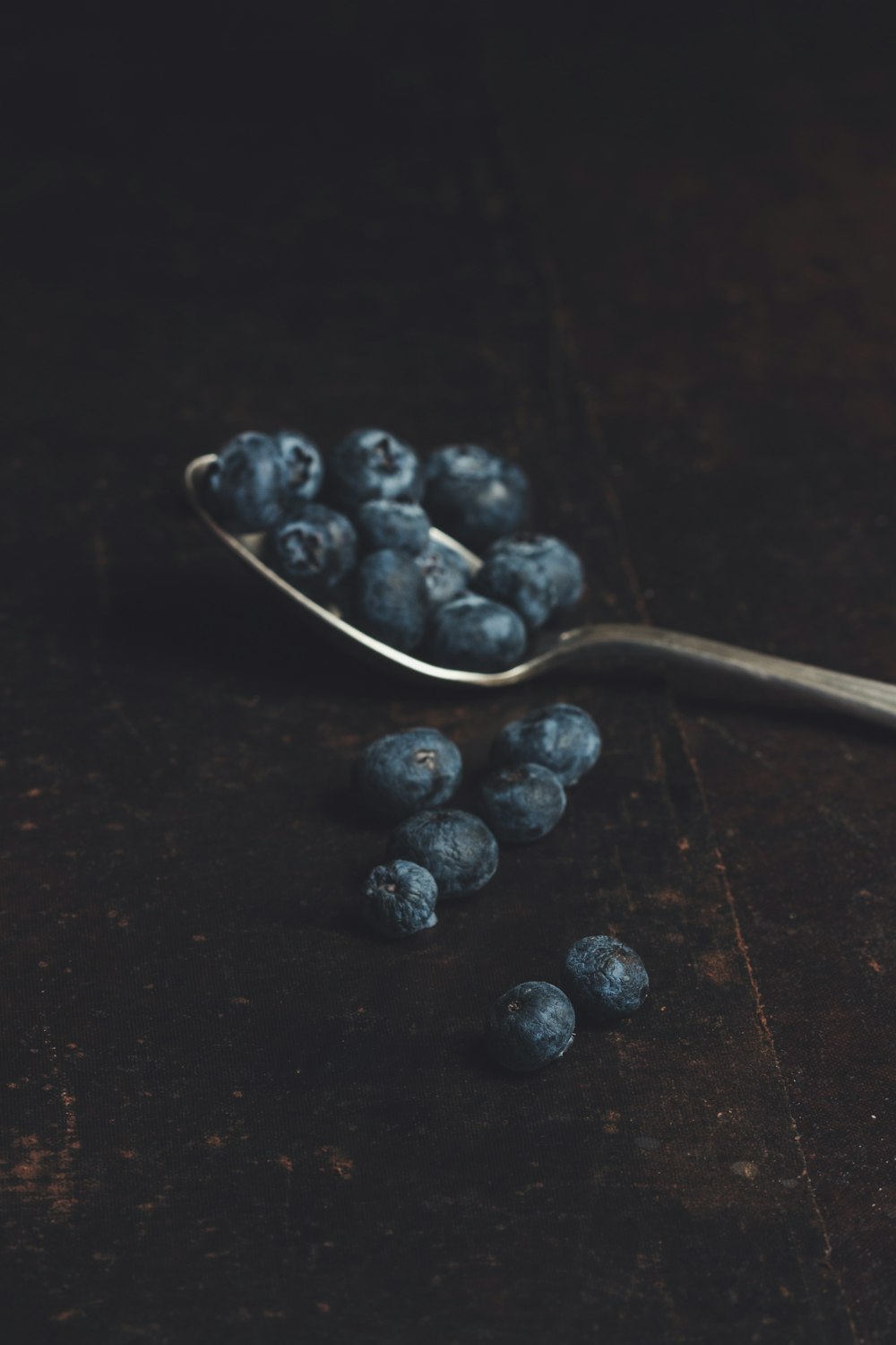 blueberry on spoon