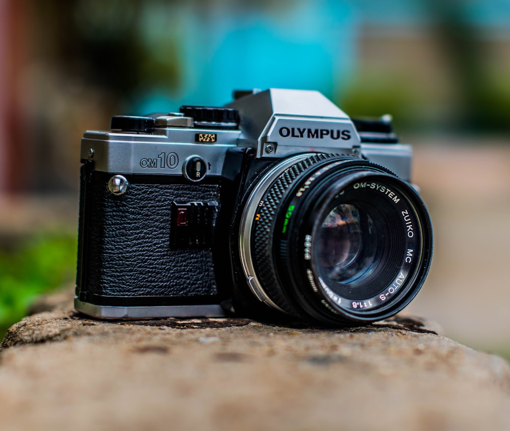 macro shot of black Olympus camera