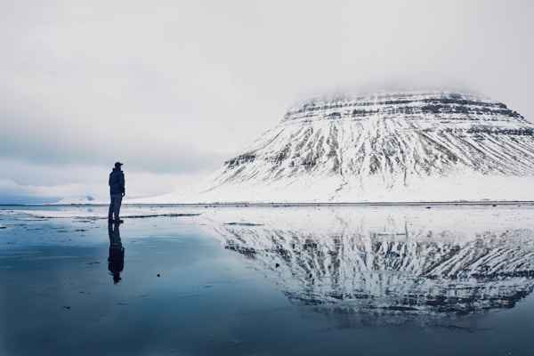 person near mountain