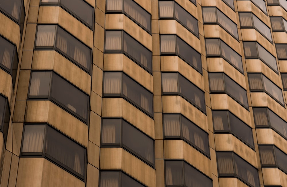 photo of brown painted high-rise building