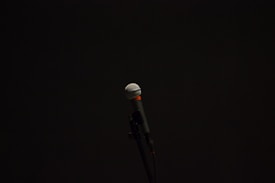 black corded microphone with stand