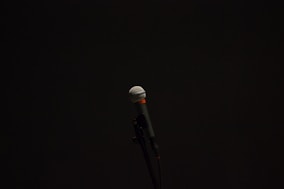 black corded microphone with stand