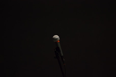 black corded microphone with stand