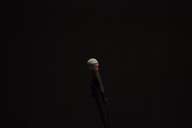 black corded microphone with stand