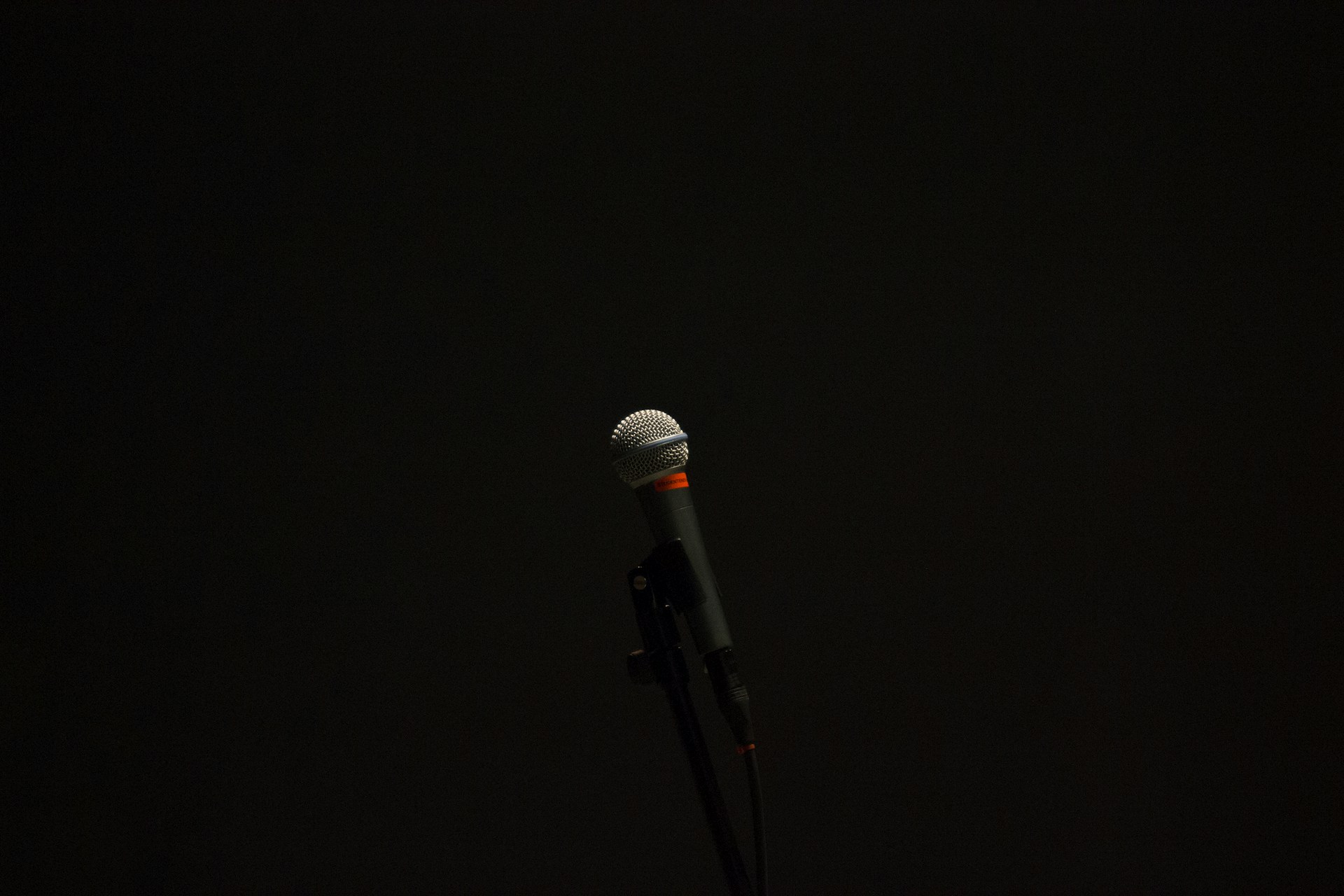 black corded microphone with stand