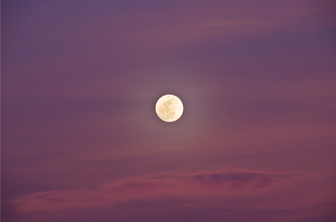 full moon on purple sky