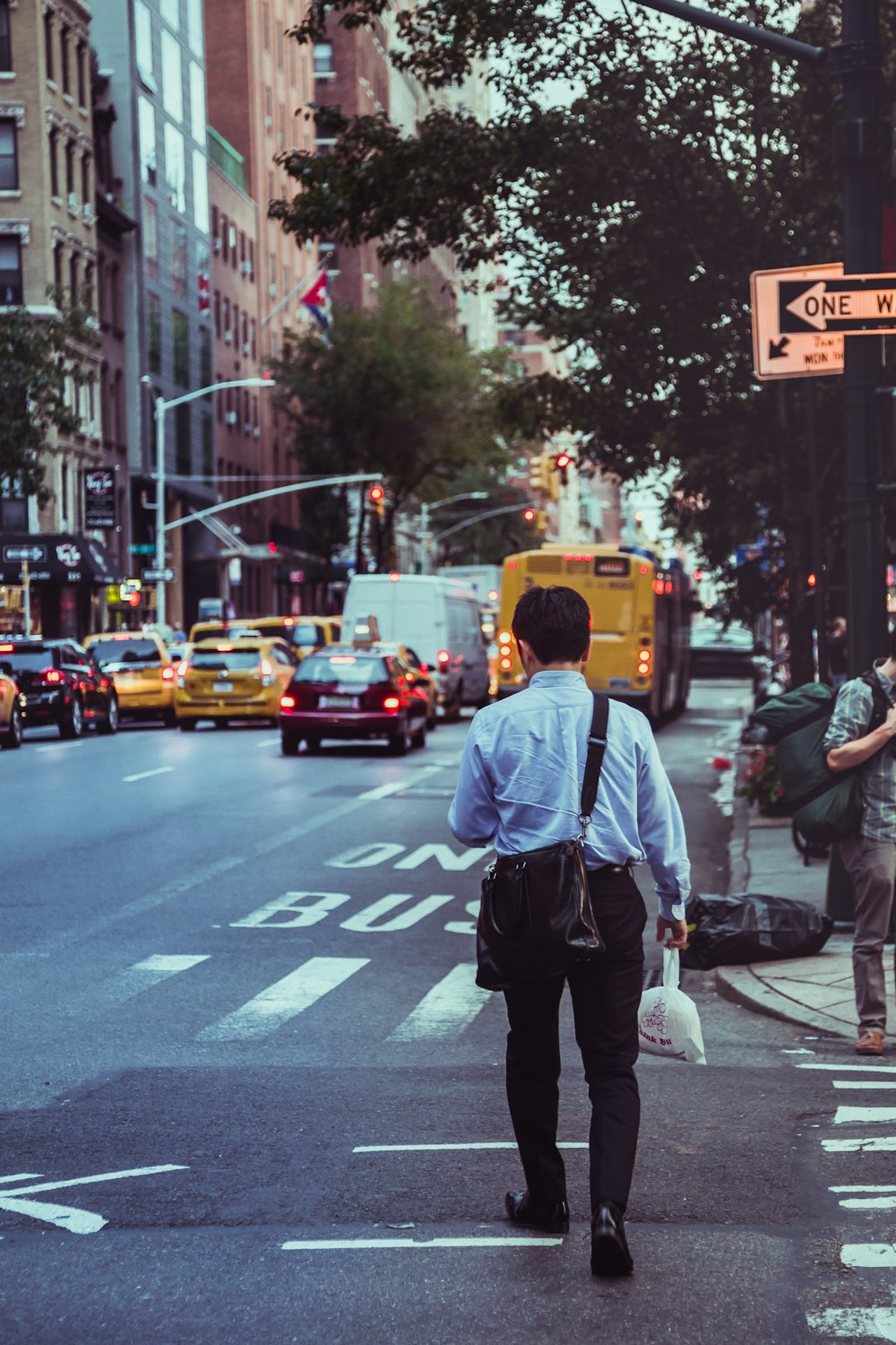 man walking on street