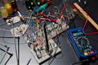 A variety of ESD control products arranged on a workbench.