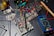 Close-up of electrical equipment components arranged neatly on a workbench.