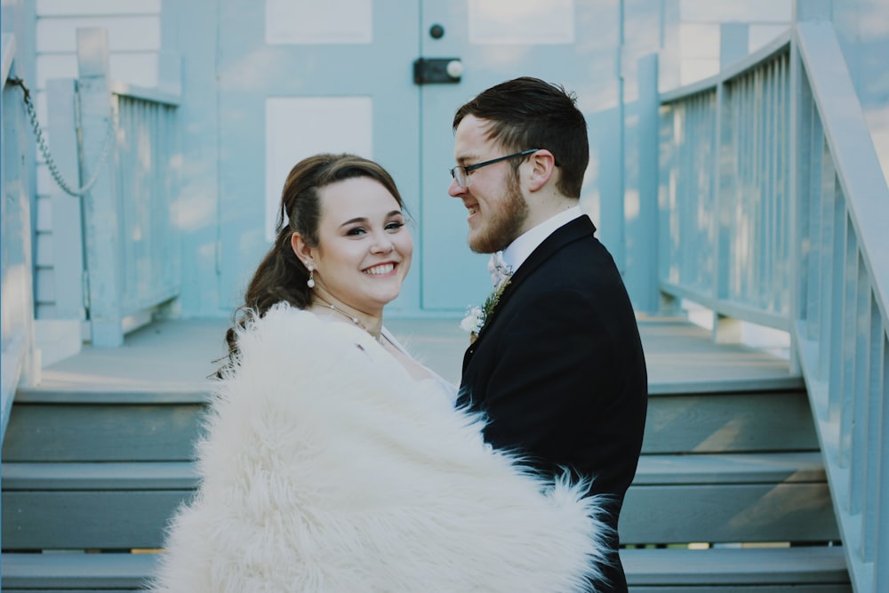 wedding couple near stair during daytime photography