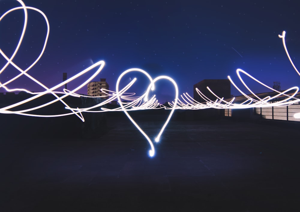 time-lapse photography of white light and buildings