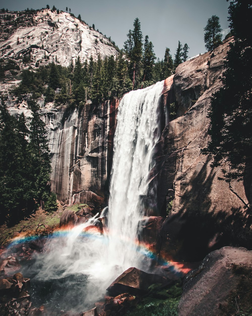 time-lapse photography of waterfalls with rees