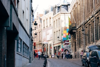 A lively street scene in Plovdiv’s old town with colorful murals and cobblestone alleys.