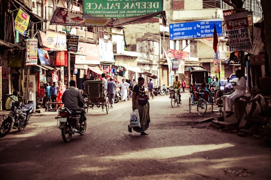 photo of people on street during daytime in Varanasi India